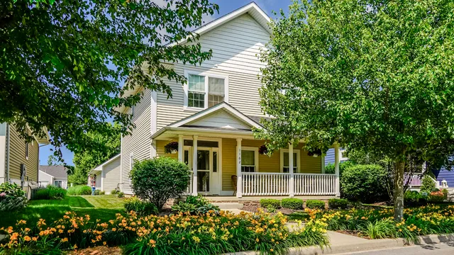 front view of a house with a yard