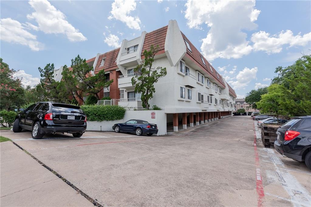 3115 Helms Street, Unit 116 Austin, TX 78705 - Photo 11 of 12 View of apartment building / complex with uncovered parking