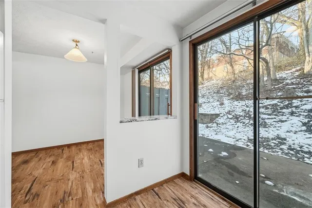 a window with wooden floor