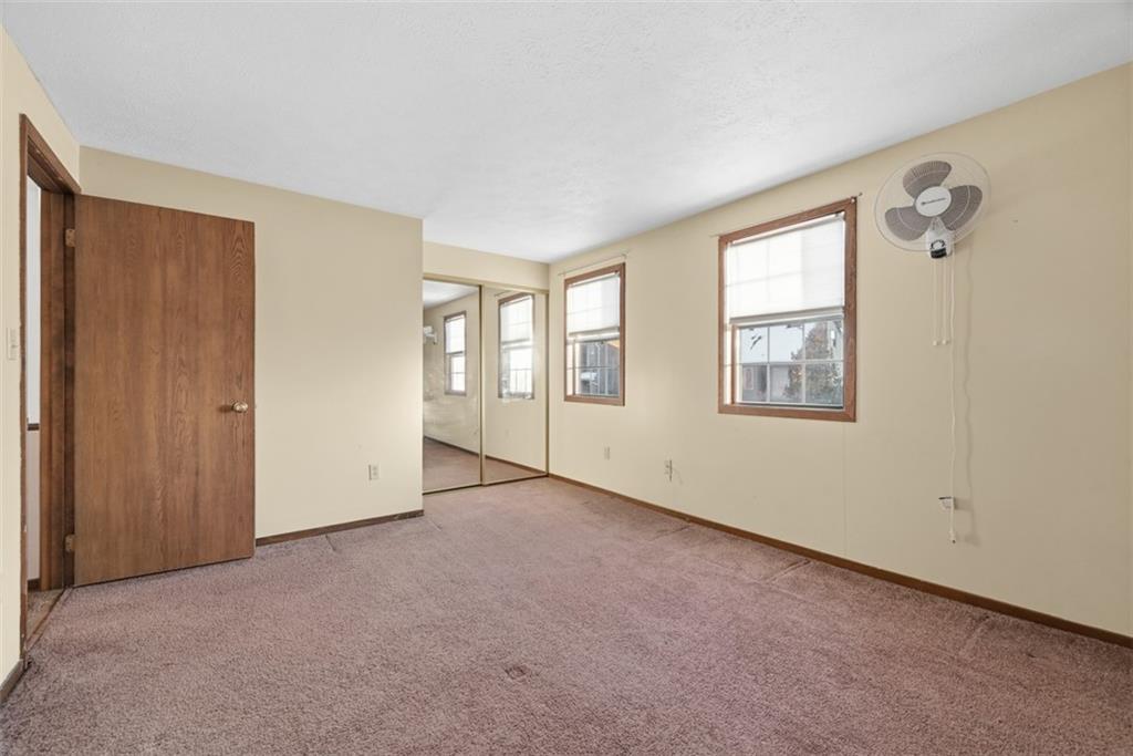 14 Bethany Drive, Unit A Pittsburgh, PA 15215 - Photo 18 of 23 an empty room with windows