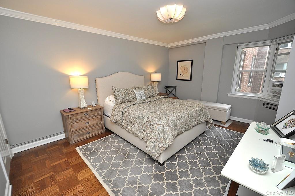 235 Garth Road, Unit E2E Scarsdale, NY 10583 - Photo 18 of 46 The large bedroom has two closets, a bay window and refinished parquet floors. The bedroom is approx. 15'-4" x 11'-9".