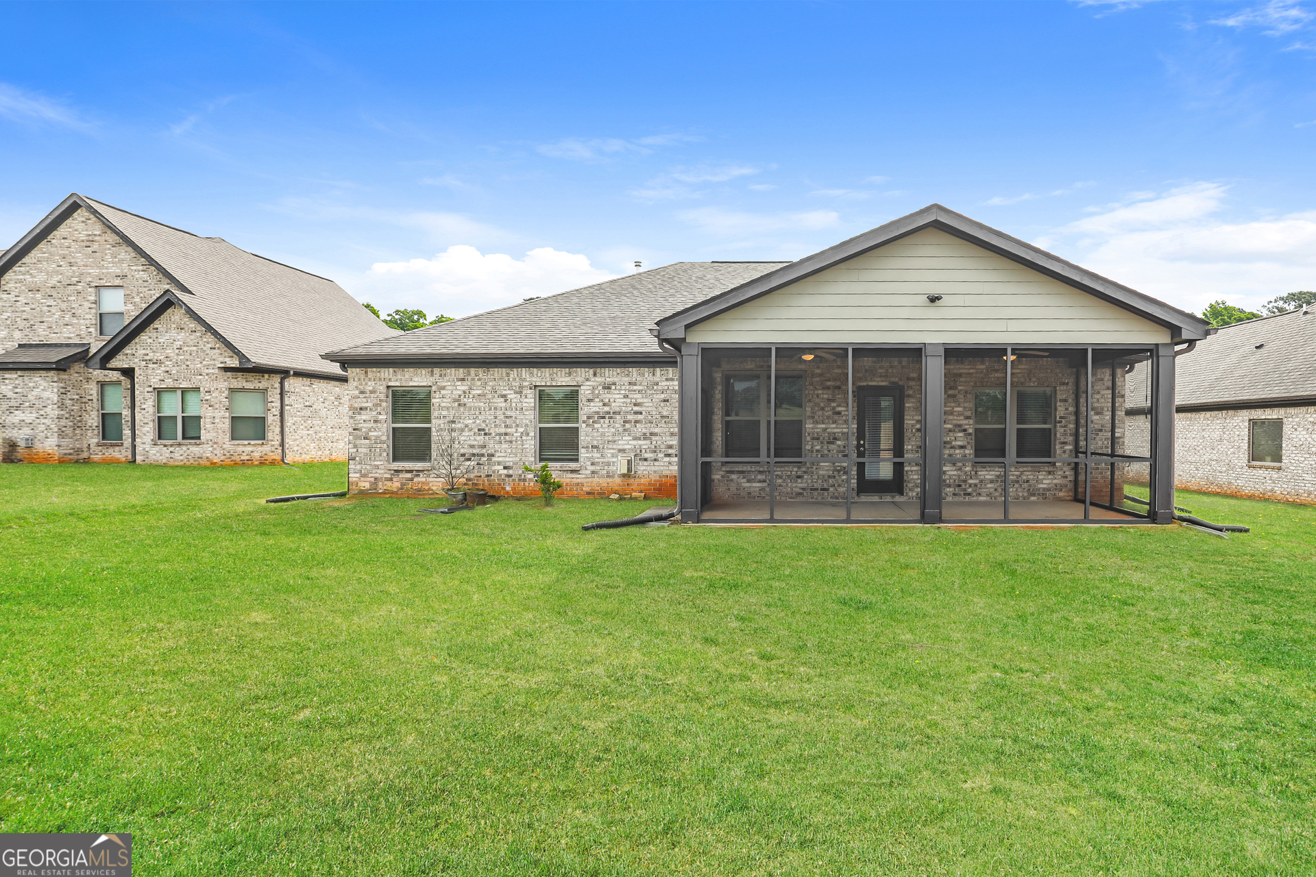 3216 Alhambra Circle Hampton, GA 30228 - Photo 20 of 21 a view of a house with backyard and porch