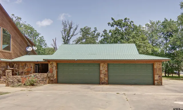 a view of a house with a garage