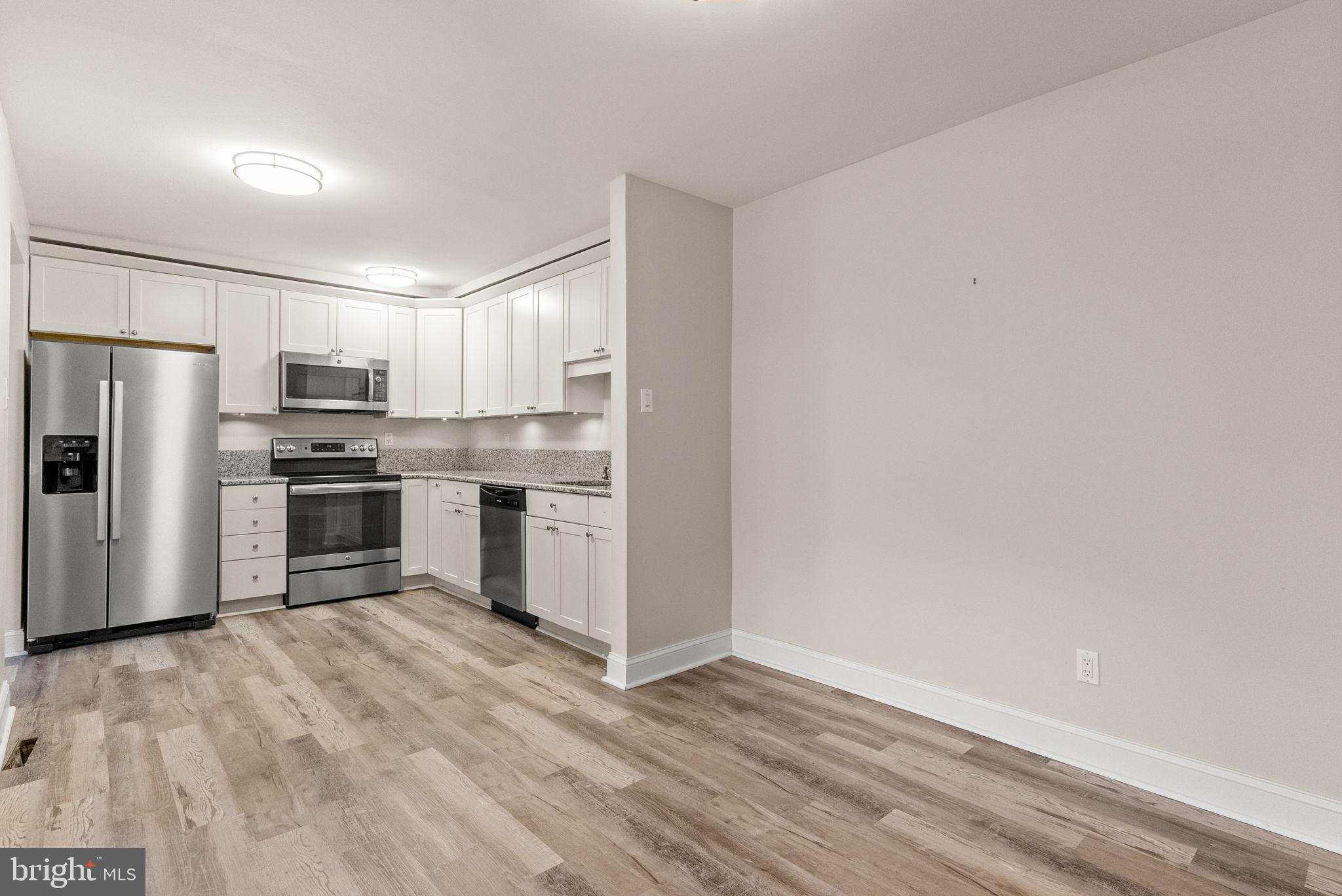 1402 Raintree Lane, Unit 1402 Malvern, PA 19355 - Photo 12 of 32 Updated kitchen
