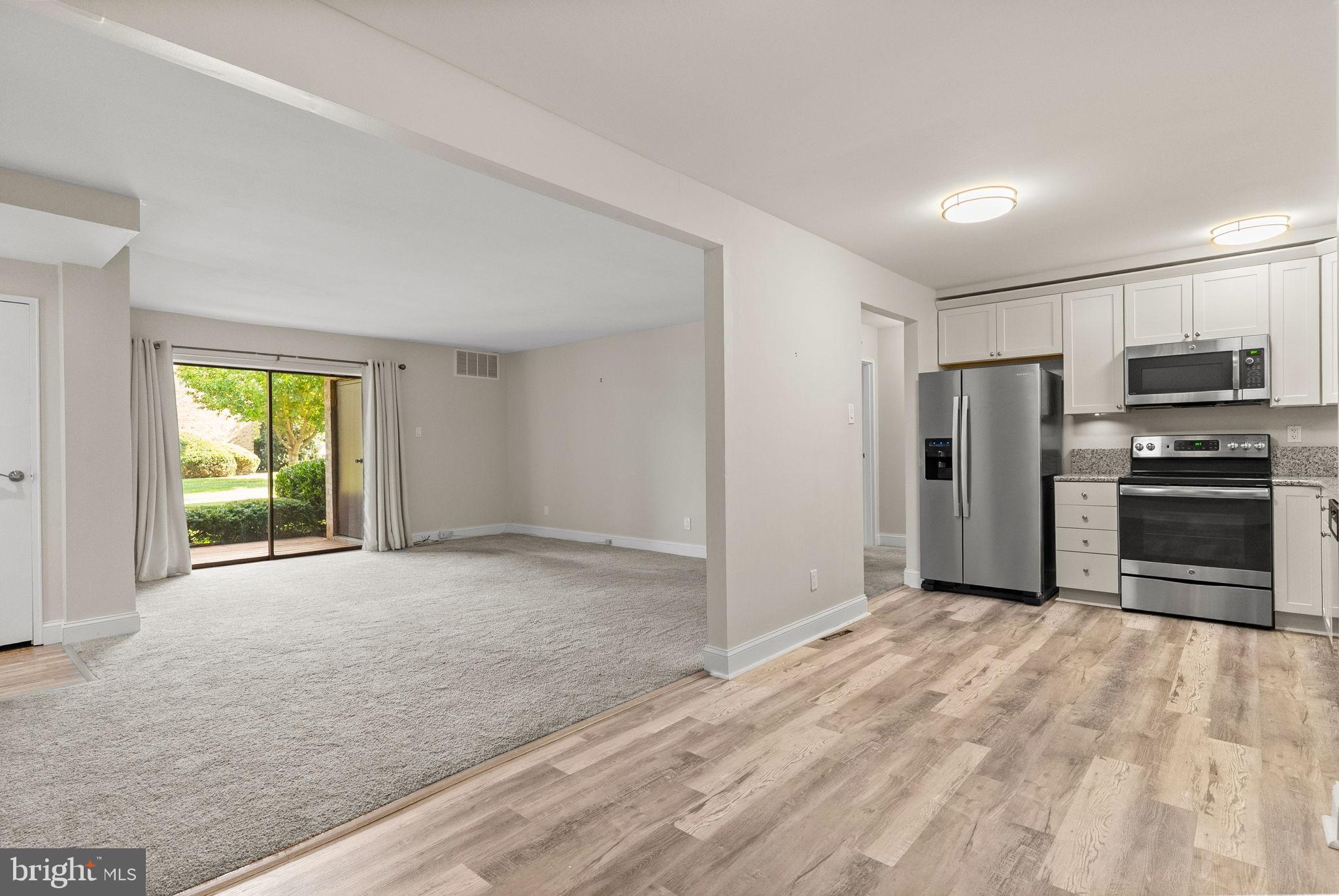 1402 Raintree Lane, Unit 1402 Malvern, PA 19355 - Photo 13 of 32 Spacious open layout with natural light.