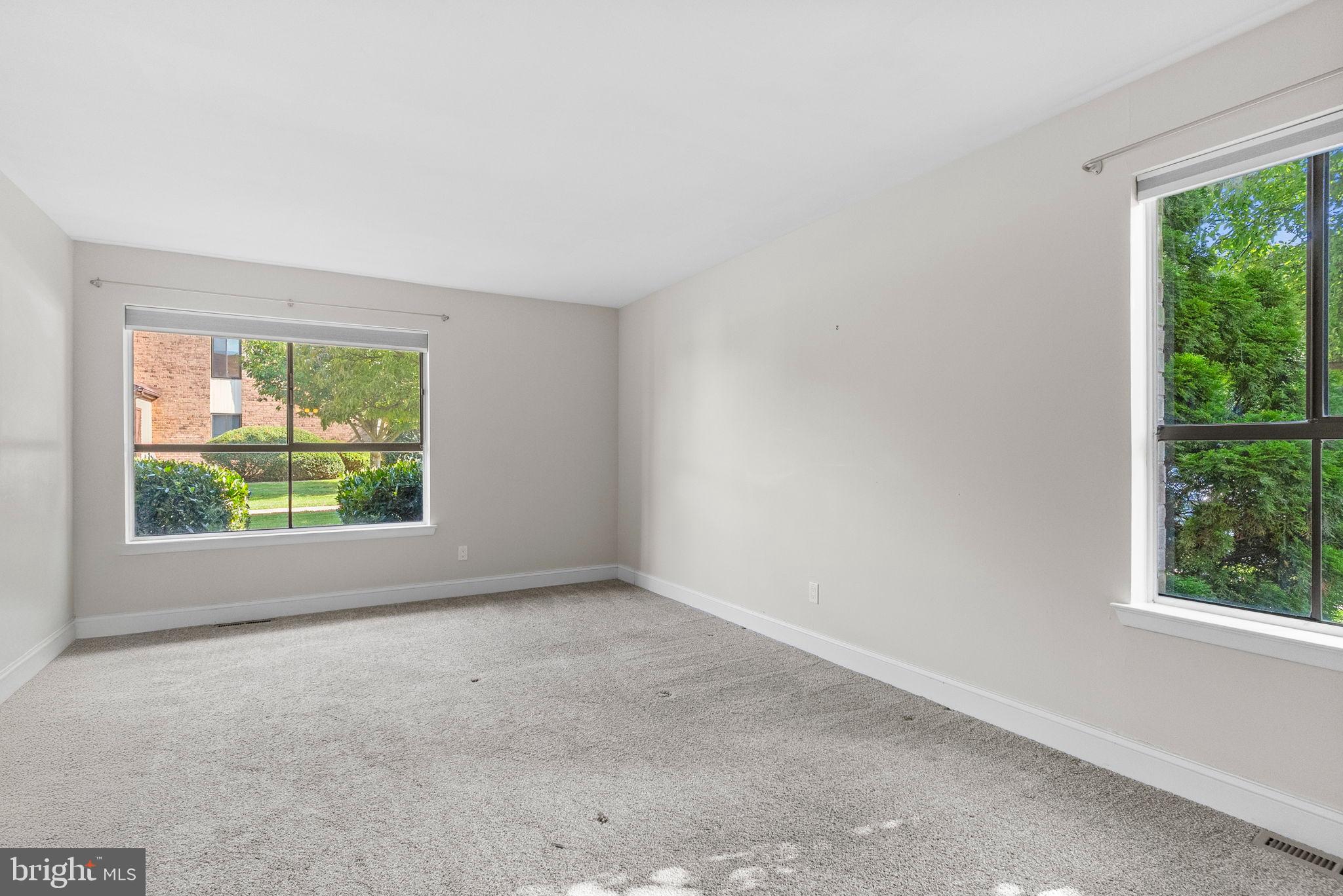 1402 Raintree Lane, Unit 1402 Malvern, PA 19355 - Photo 19 of 32 Bright and airy space with garden views.