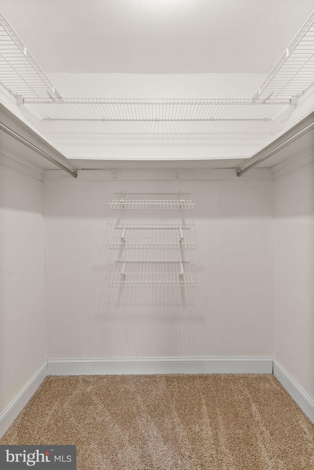 1402 Raintree Lane, Unit 1402 Malvern, PA 19355 - Photo 22 of 32 Spacious closet with organized shelving.