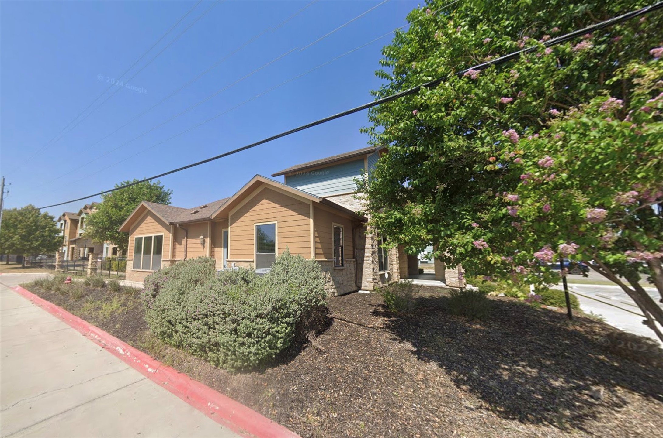 163 Yucca Park Road Del Rio, TX 78840 - Photo 3 of 6 a front view of a house with garden