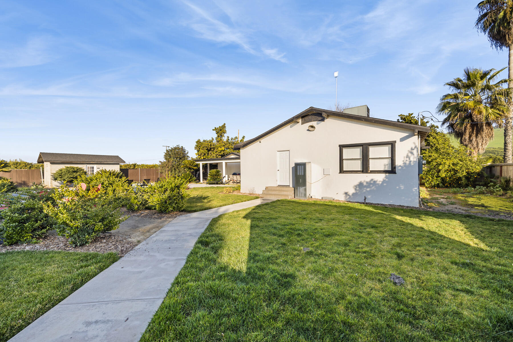29205 Road 210 Exeter, CA 93221 - Photo 29 of 44 a front view of a house with a yard