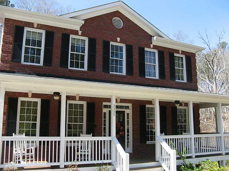 Exterior Front. Such a Beautiful House with a wrap around porch and 3 car garage!