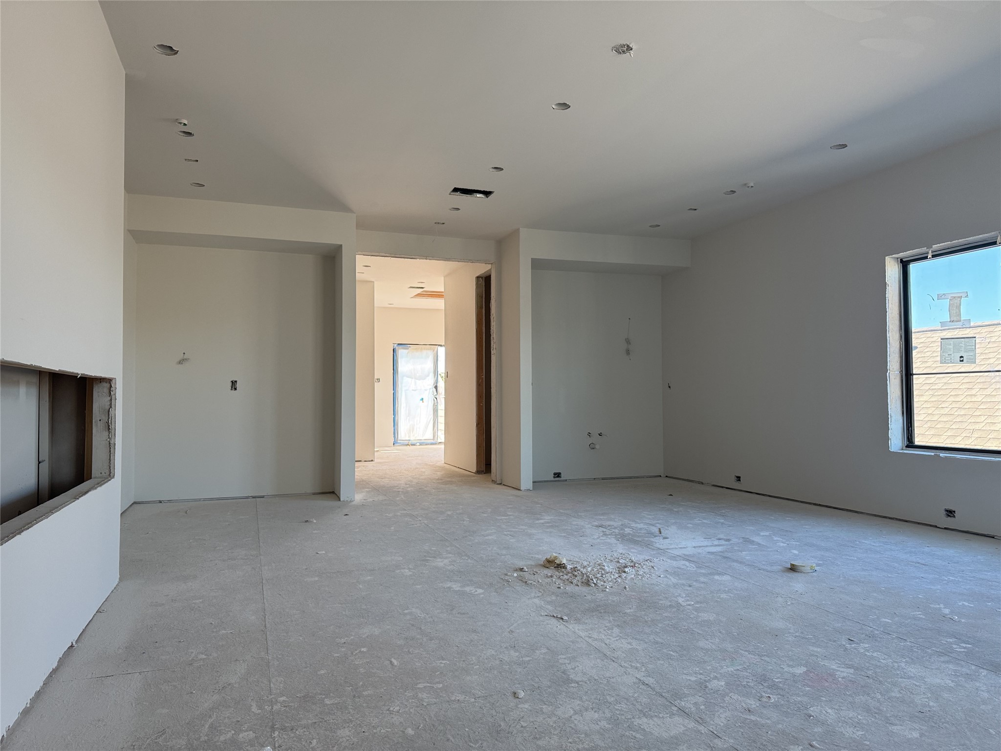 6405 Pickens Street Houston, TX 77007 - Photo 7 of 7 a view of an empty room with a window