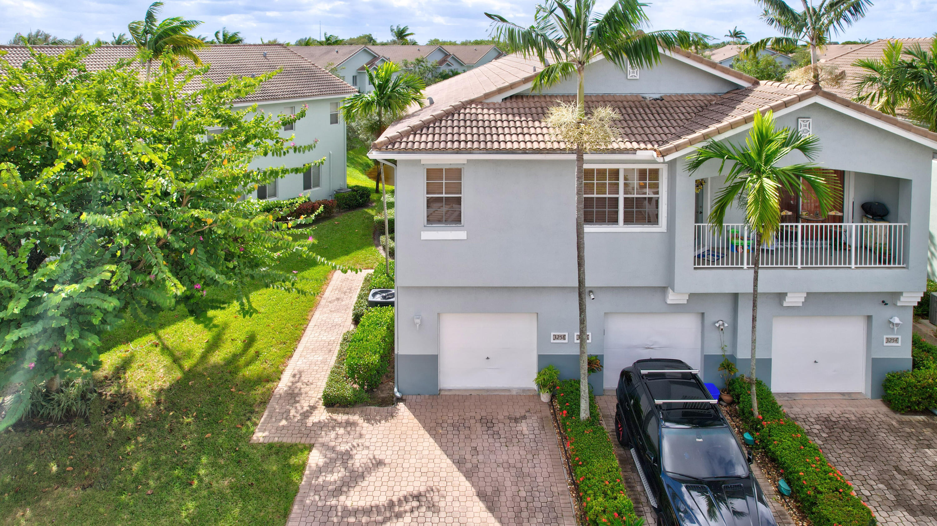 3258 Laurel Ridge Circle Riviera Beach, FL 33404 - Photo 3 of 27 Front of Home