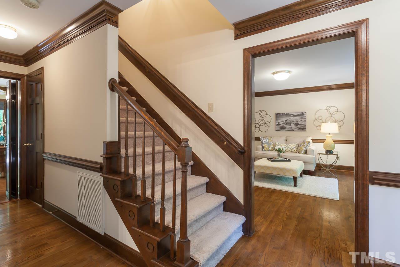 2901 Patrie Place Raleigh, NC 27613 - Photo 2 of 25 a view of entryway and hall with wooden floor