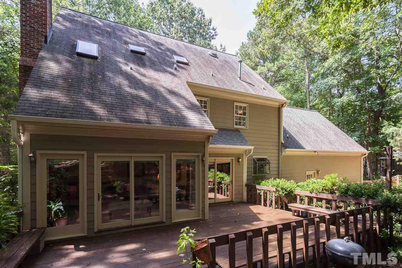 2901 Patrie Place Raleigh, NC 27613 - Photo 24 of 25 a view of a house with backyard and sitting area