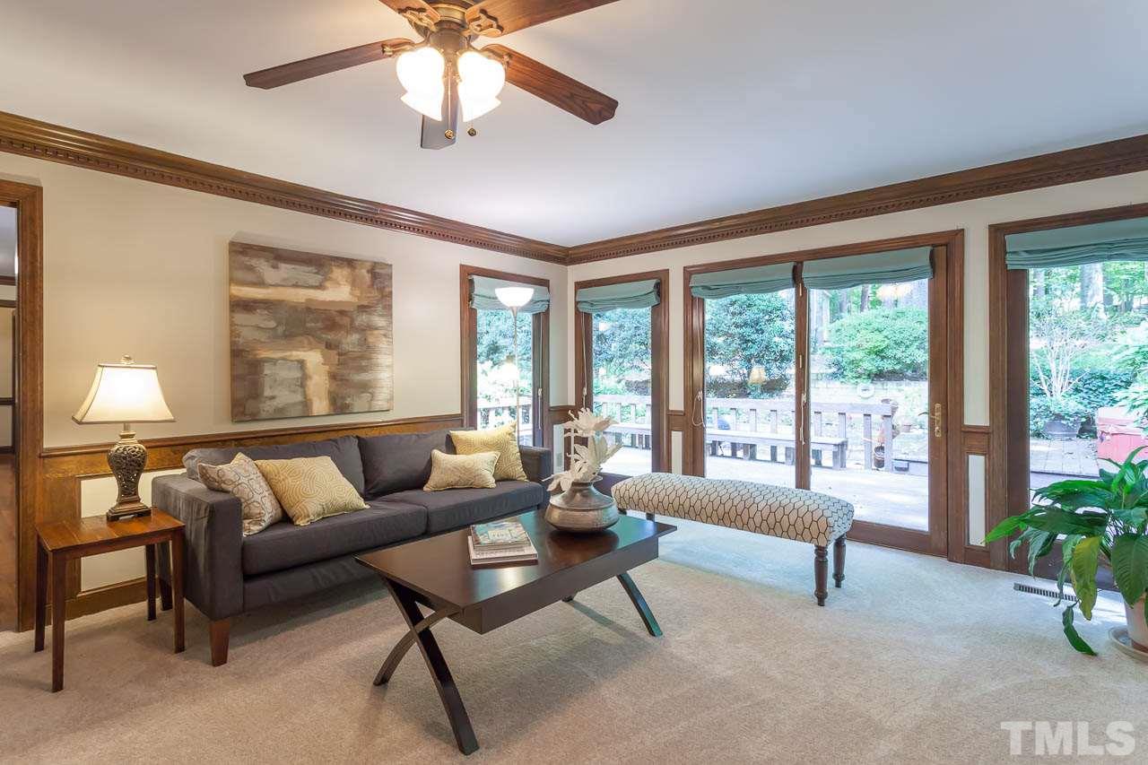 2901 Patrie Place Raleigh, NC 27613 - Photo 8 of 25 a living room with furniture and a large window