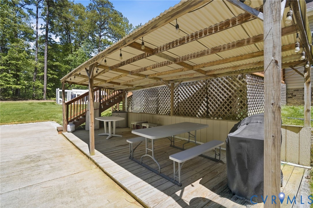 3600 Market Road Mechanicsville, VA 23111 - Photo 56 of 67 a patio with table and chairs