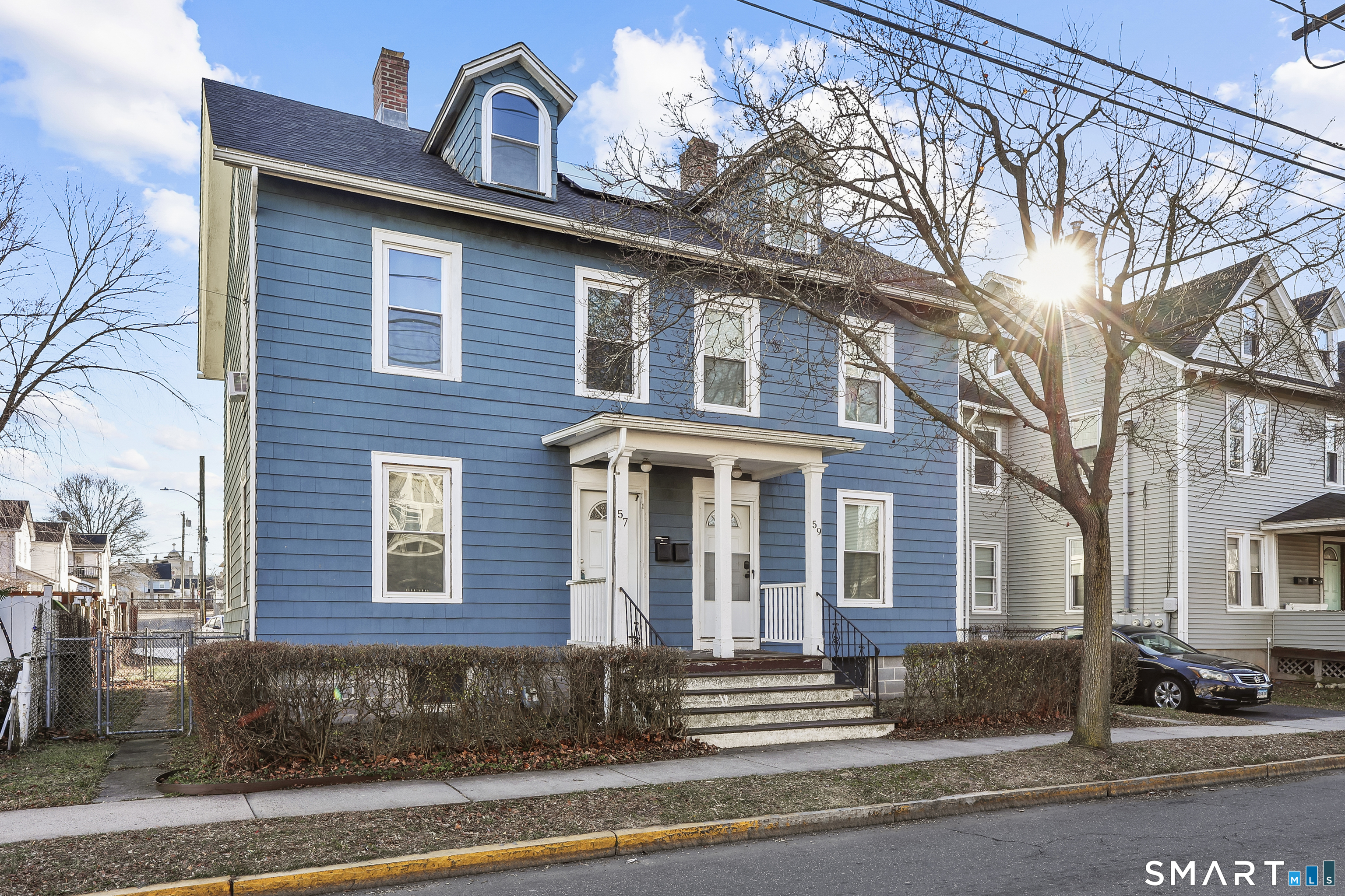59 Grand Street Middletown, CT 06457 - Photo 27 of 33 a front view of a house with a yard