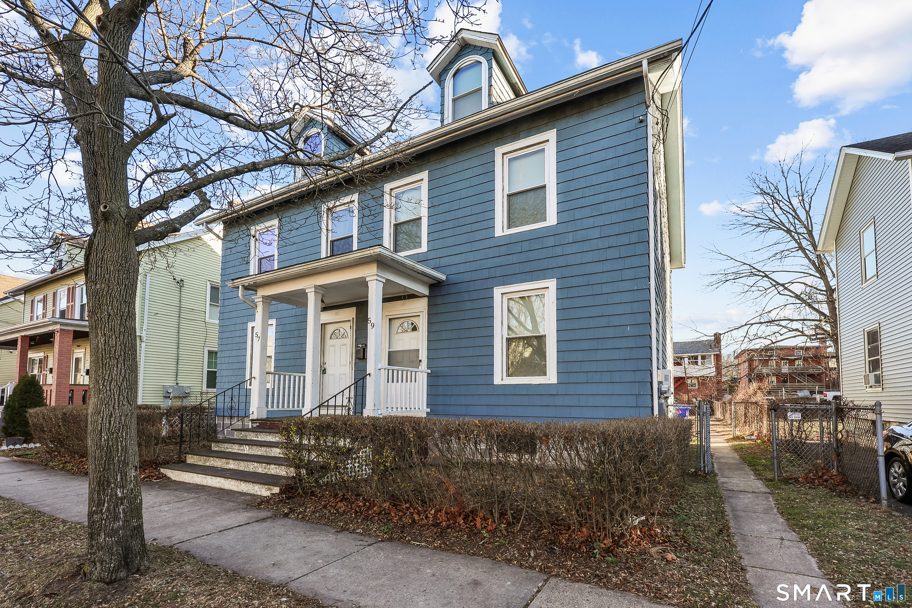 59 Grand Street Middletown, CT 06457 - Photo 28 of 33 a front view of a house with a yard