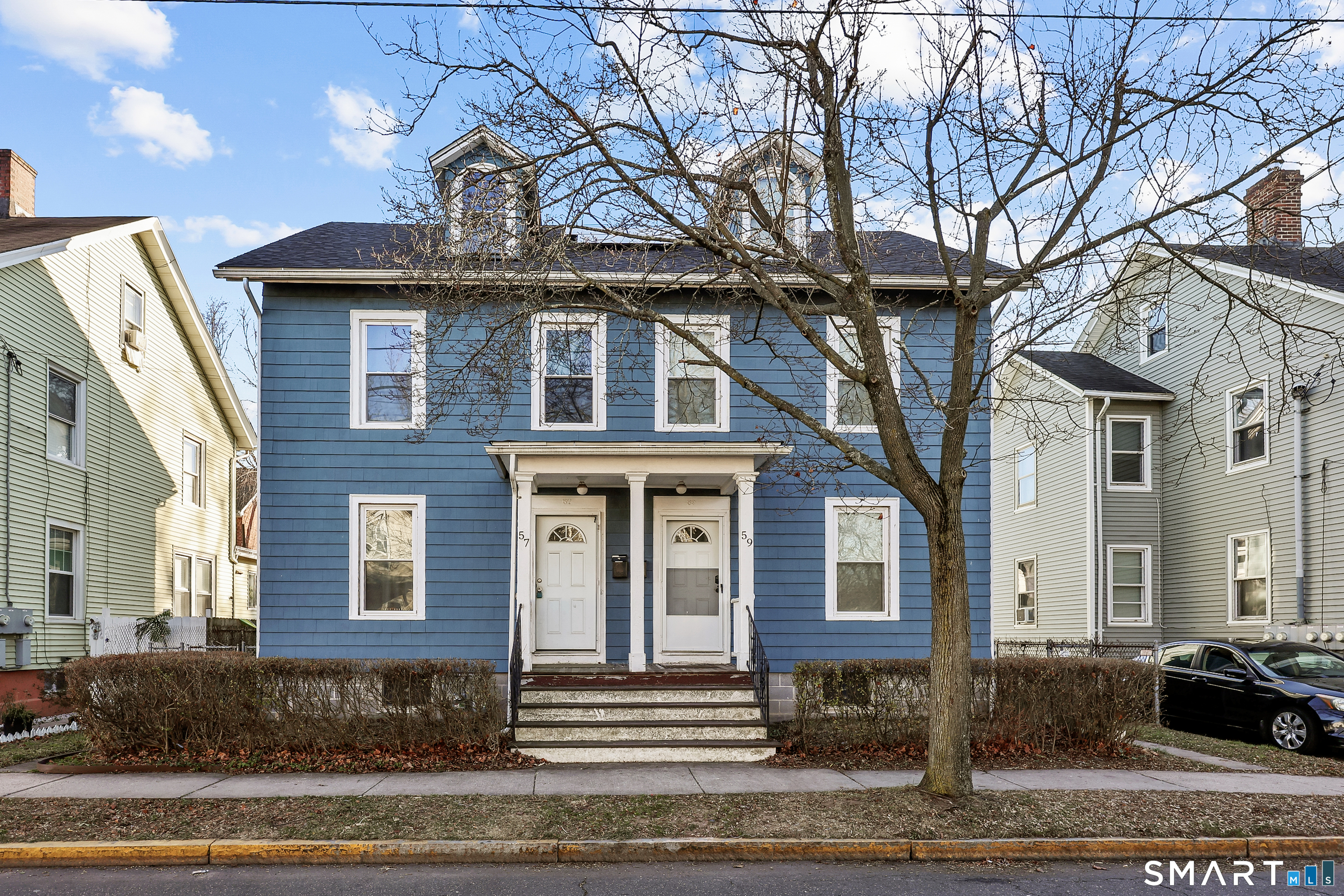 59 Grand Street Middletown, CT 06457 - Photo 29 of 33 a front view of a house