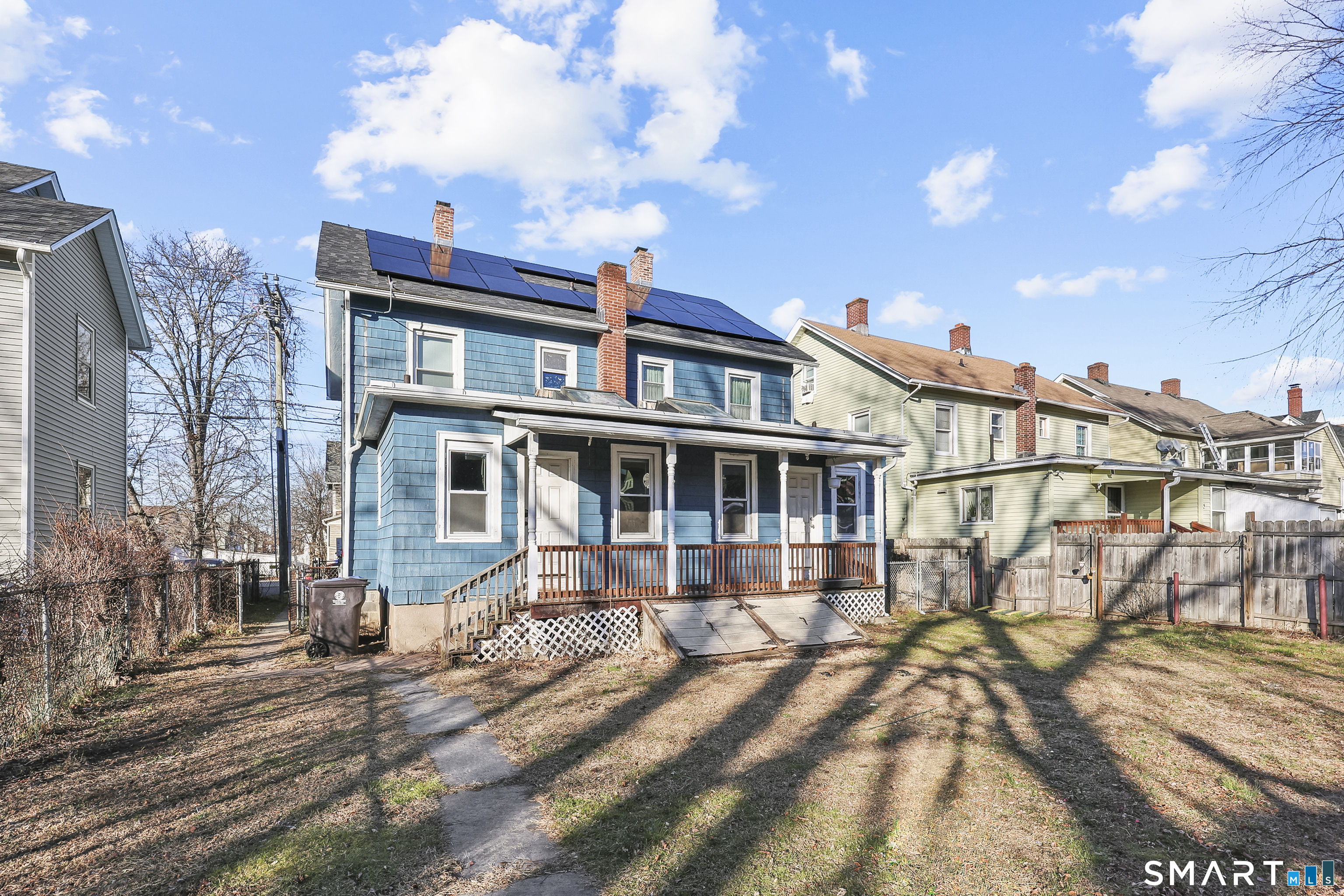 59 Grand Street Middletown, CT 06457 - Photo 32 of 33 a front view of a house with a yard