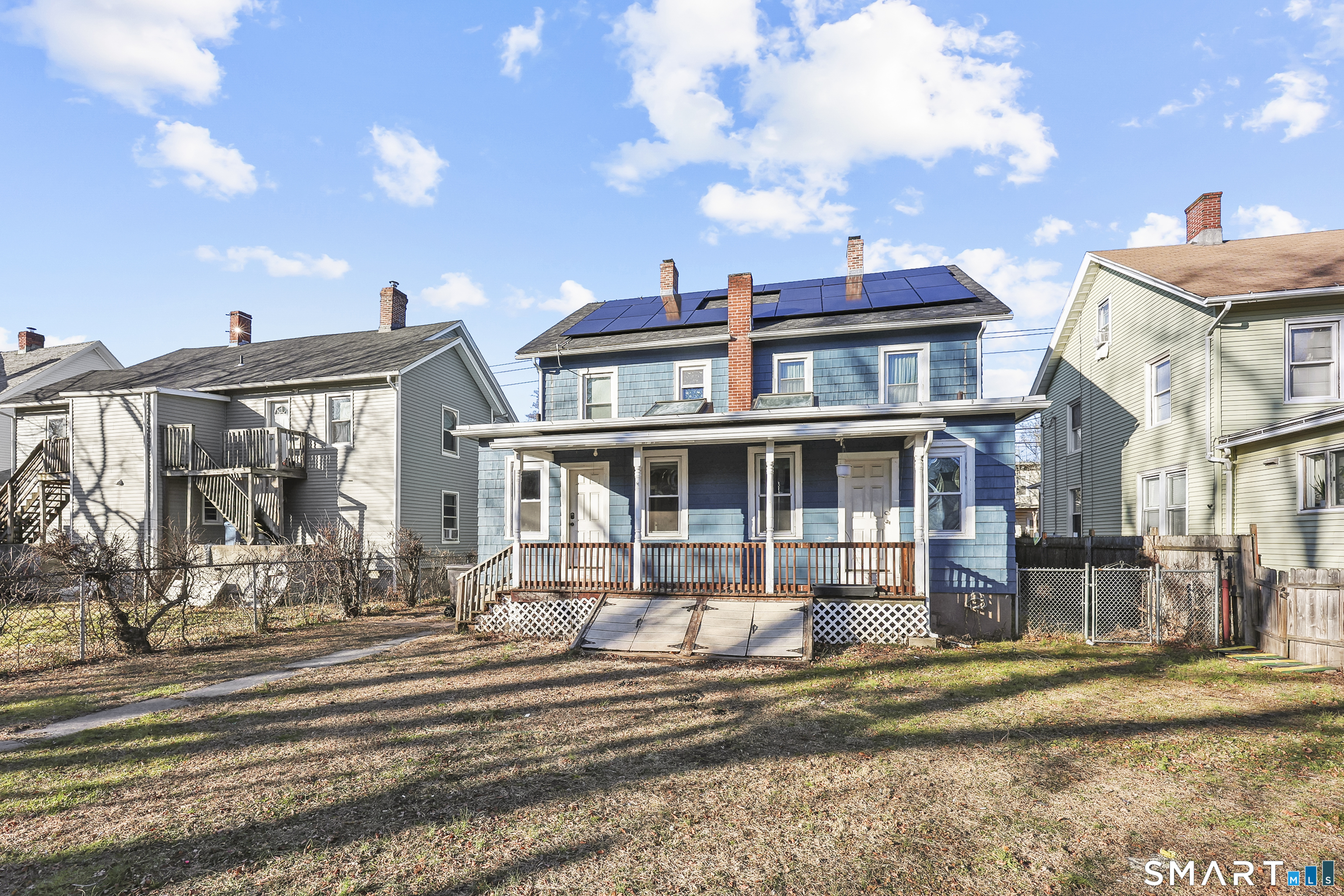 59 Grand Street Middletown, CT 06457 - Photo 33 of 33 a front view of a building with street view and trees