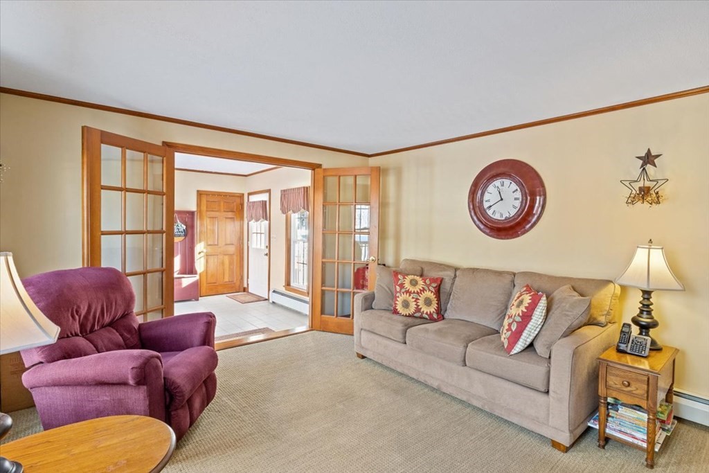 5 Sandy Lane Assonet, MA 02702 - Photo 11 of 34 a living room with furniture and a large window