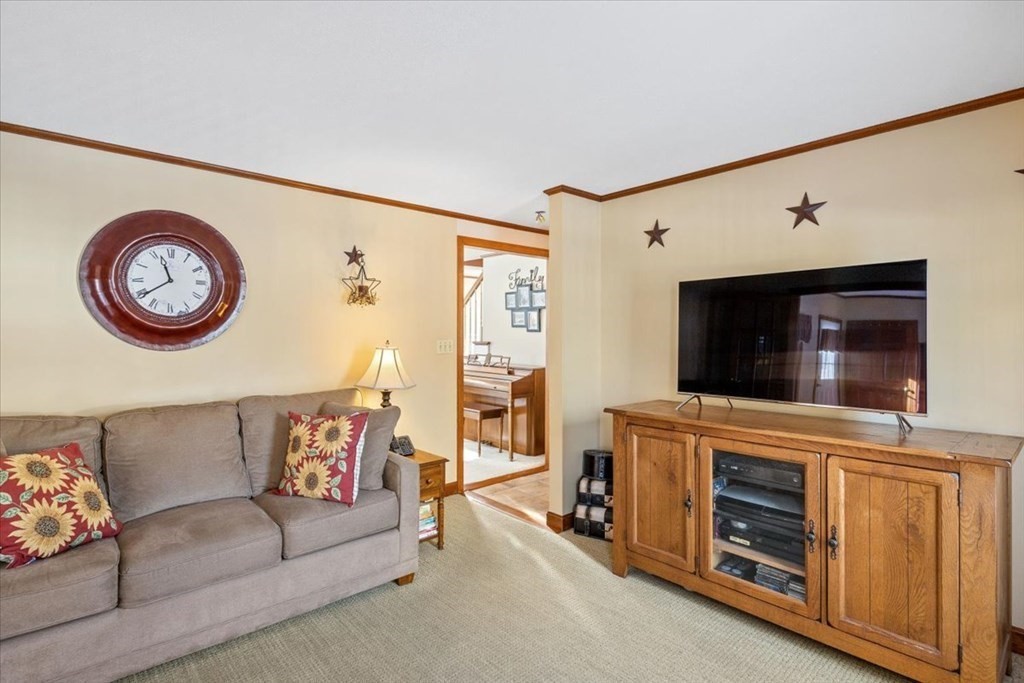 5 Sandy Lane Assonet, MA 02702 - Photo 13 of 34 a living room with furniture and a flat screen tv