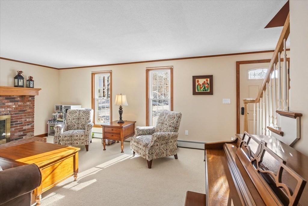 5 Sandy Lane Assonet, MA 02702 - Photo 20 of 34 a living room with furniture and a large window