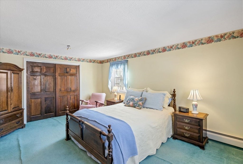 5 Sandy Lane Assonet, MA 02702 - Photo 27 of 34 a bedroom with a bed and a window