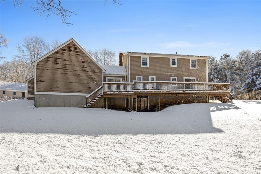 5 Sandy Lane Assonet, MA 02702 - Photo 5 of 34 a view of a house with a snow on the roof