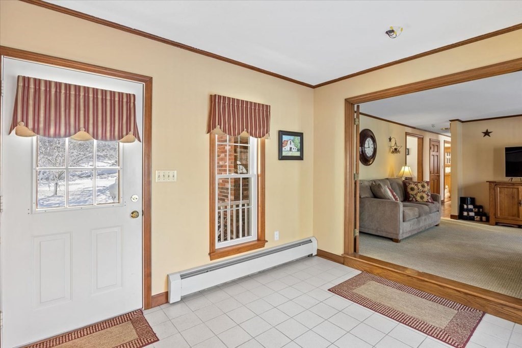 5 Sandy Lane Assonet, MA 02702 - Photo 7 of 34 a view of a livingroom with furniture and windows