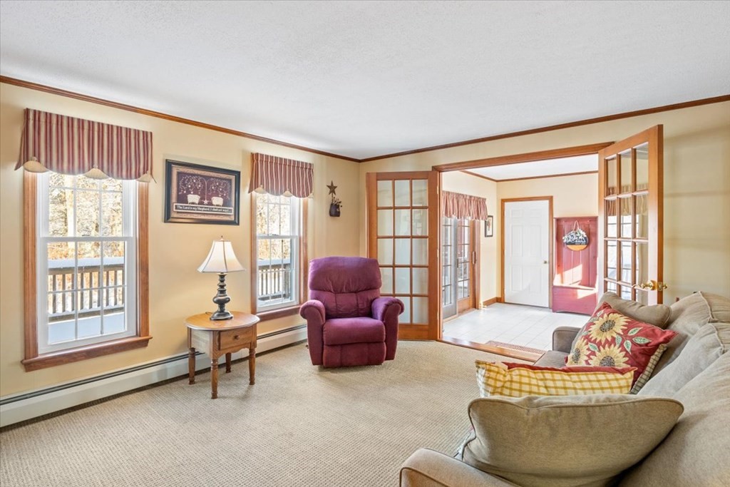 5 Sandy Lane Assonet, MA 02702 - Photo 10 of 34 a living room with furniture and a large window