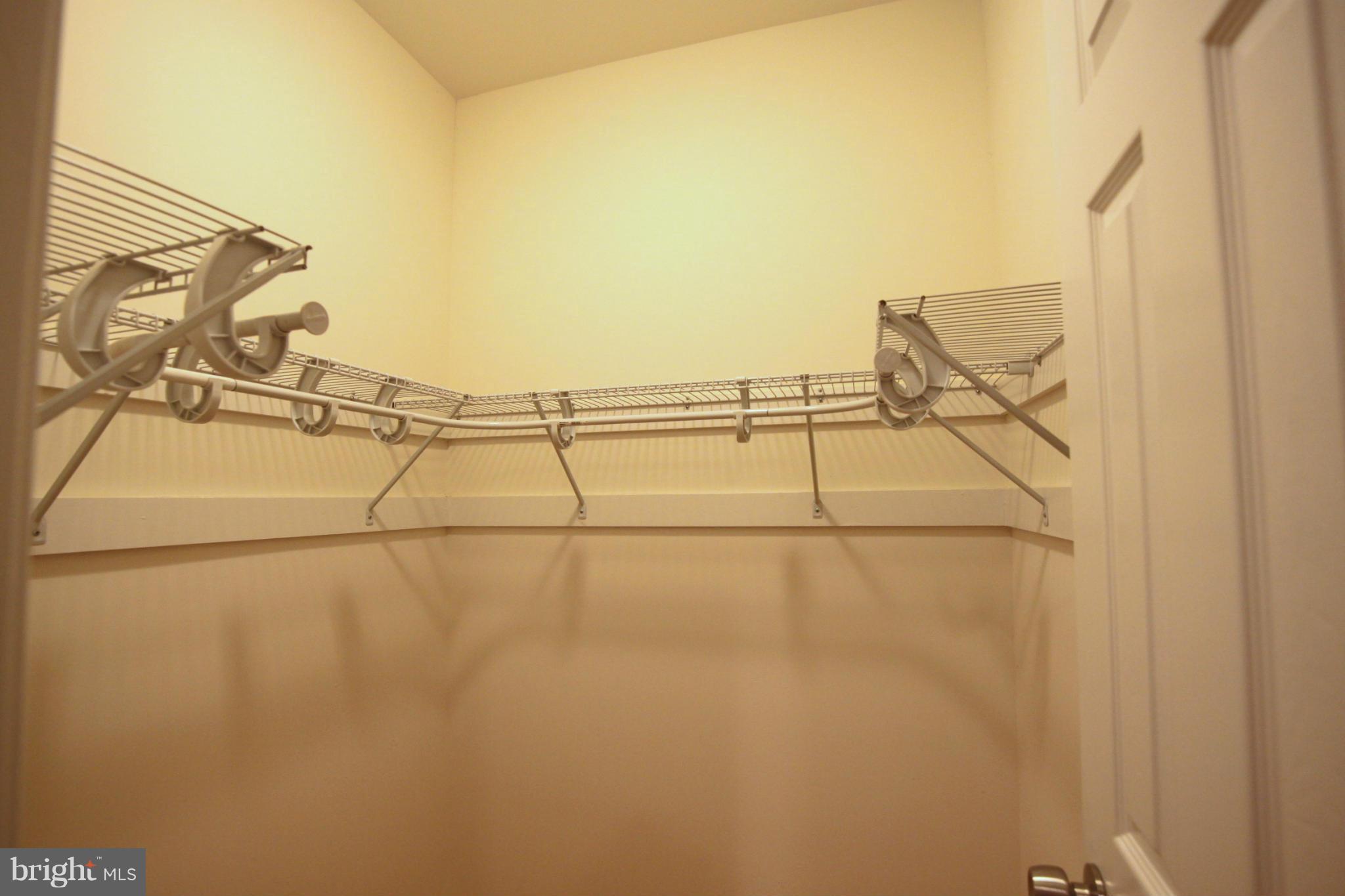23100 Neck Road Aquasco, MD 20608 - Photo 18 of 30 Main floor master bedroom walk-in closet
