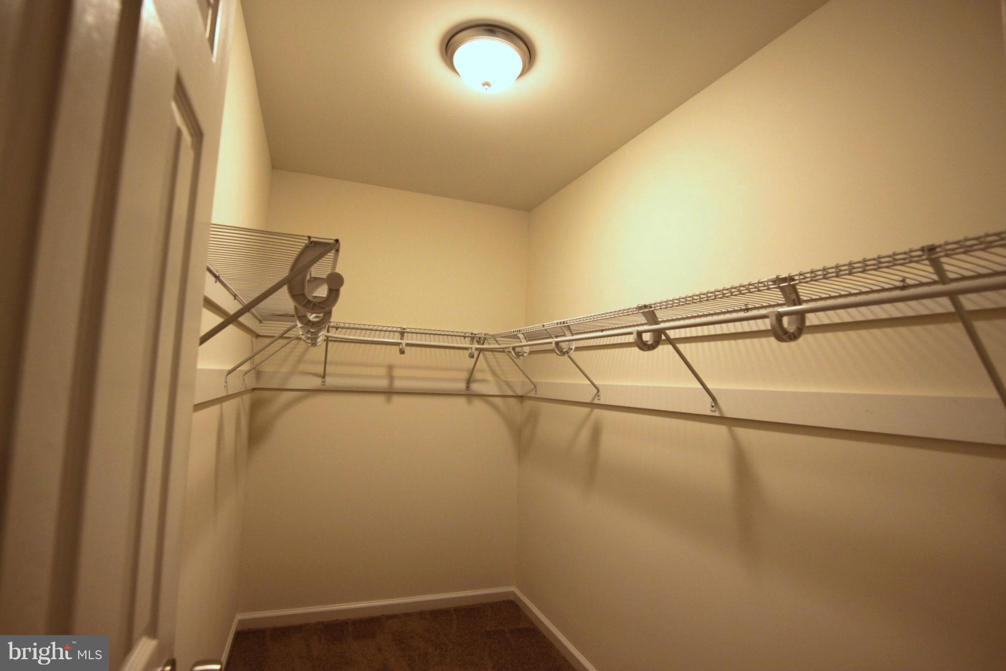 23100 Neck Road Aquasco, MD 20608 - Photo 24 of 30 Master bedroom walk-in closet