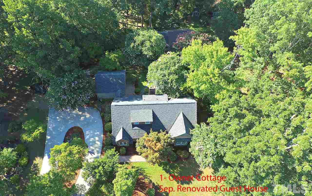 1421 Lynn Road Raleigh, NC 27612 - Photo 1 of 30 Prime Midtown location-minutes to North Hills, 540, Beltline, & every amenity imaginable. No HOA, no restrictions, huge 0.8 acre lot