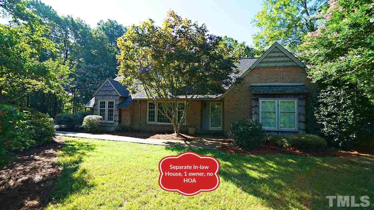 1421 Lynn Road Raleigh, NC 27612 - Photo 2 of 30 Beautiful bungalow home,, brick & fiber cement battan style home. Sits up on hill, most of yard is flat, private and fenced