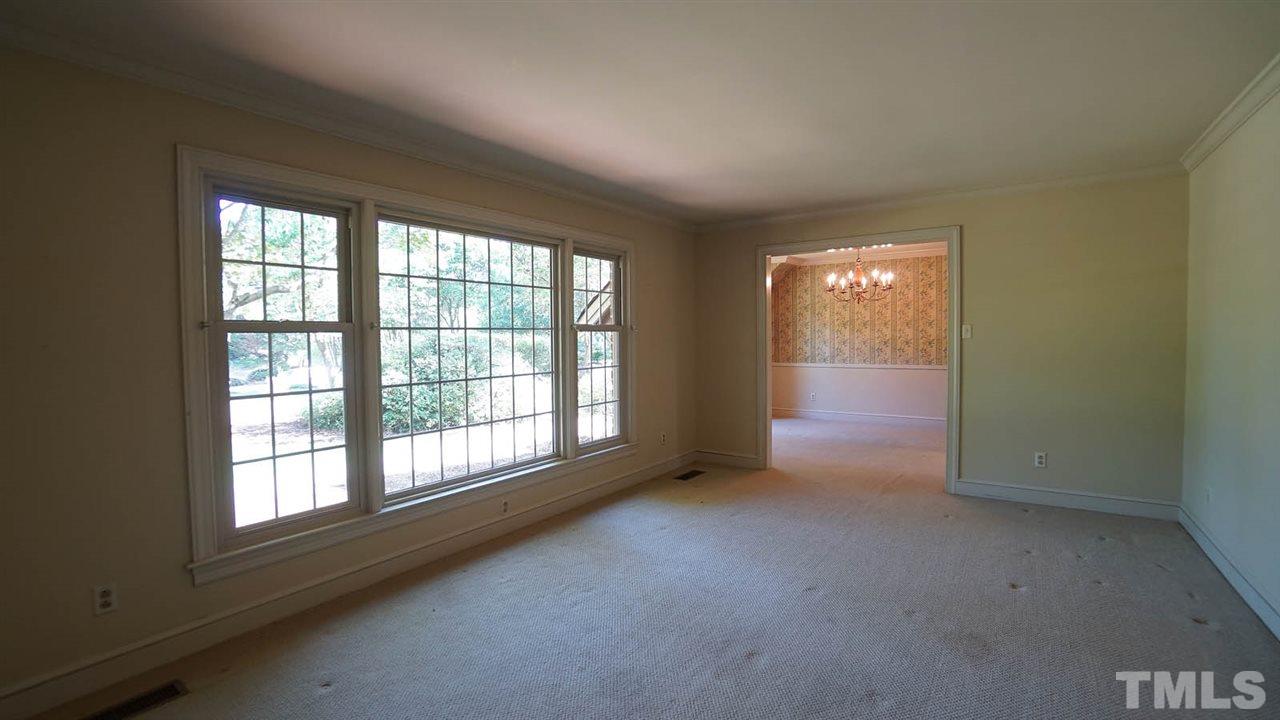 1421 Lynn Road Raleigh, NC 27612 - Photo 13 of 30 Large separate living room w/ good light.