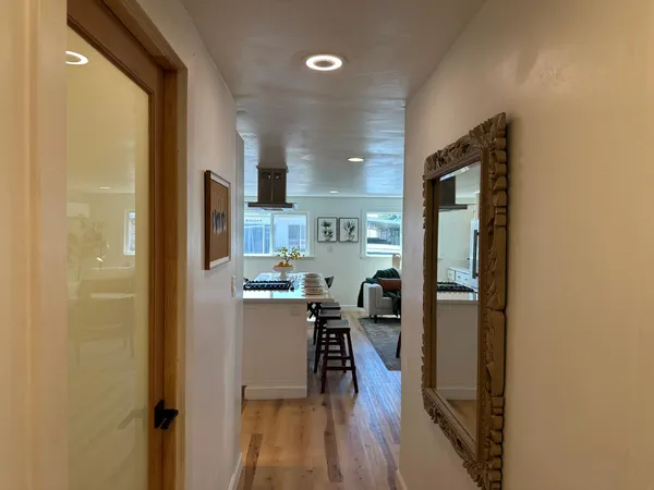 a kitchen with a table and chairs in it