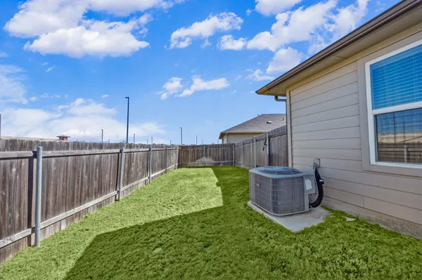 a view of a backyard with a garden