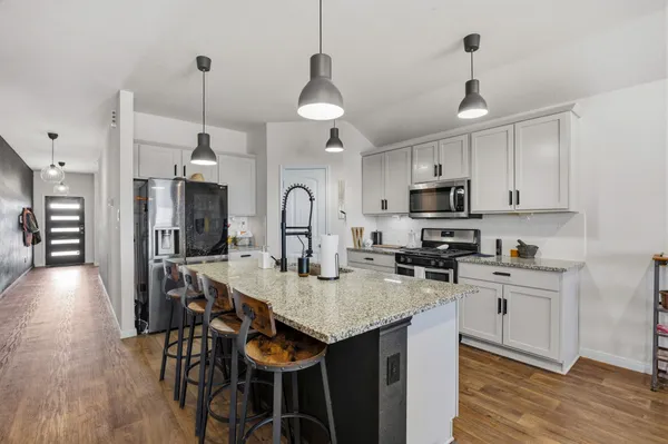 a view of a backyard with garden