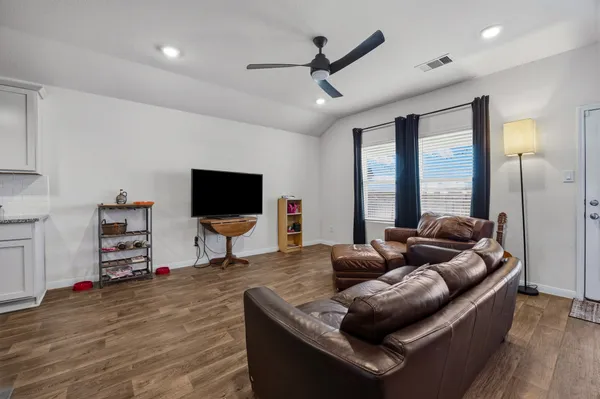a kitchen with cabinets a sink and appliances