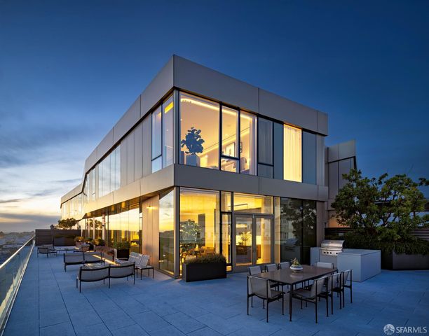 a view of living room with furniture and garden view