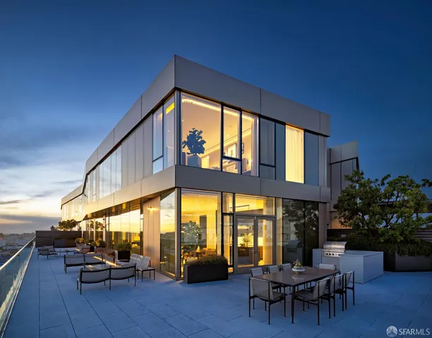 a view of living room with furniture and garden view