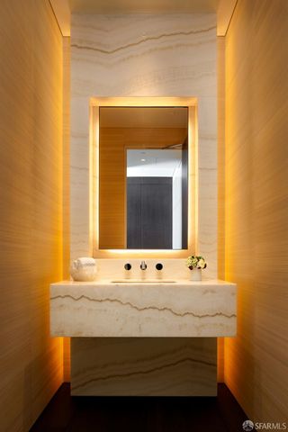 a bathroom with a sink and a mirror