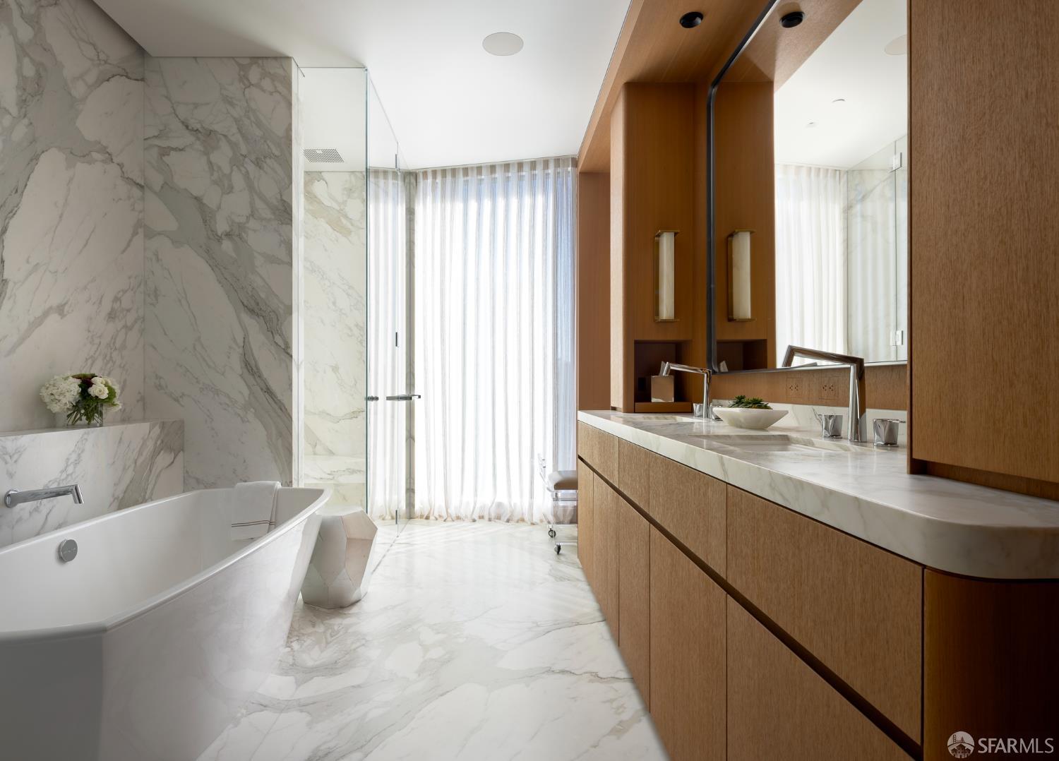 2121 Webster Street, Unit GPH1 San Francisco, CA 94115 - Photo 20 of 34 a spacious bathroom with a double vanity sink large mirror and a bathtub
