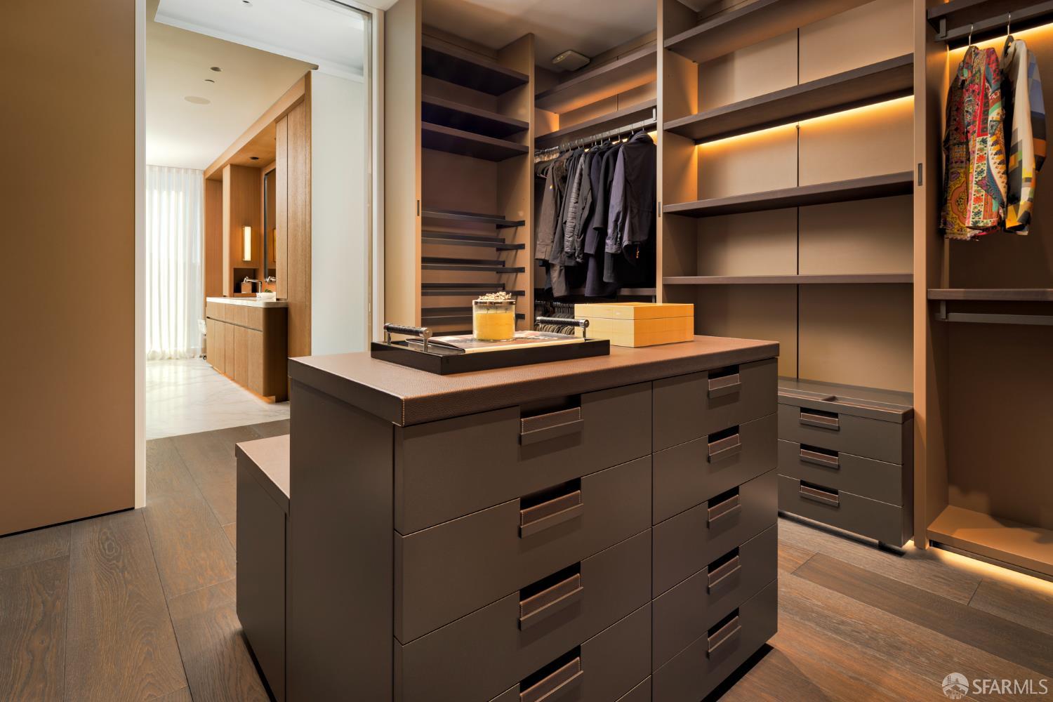 2121 Webster Street, Unit GPH1 San Francisco, CA 94115 - Photo 21 of 34 a room with cabinets and wooden floor