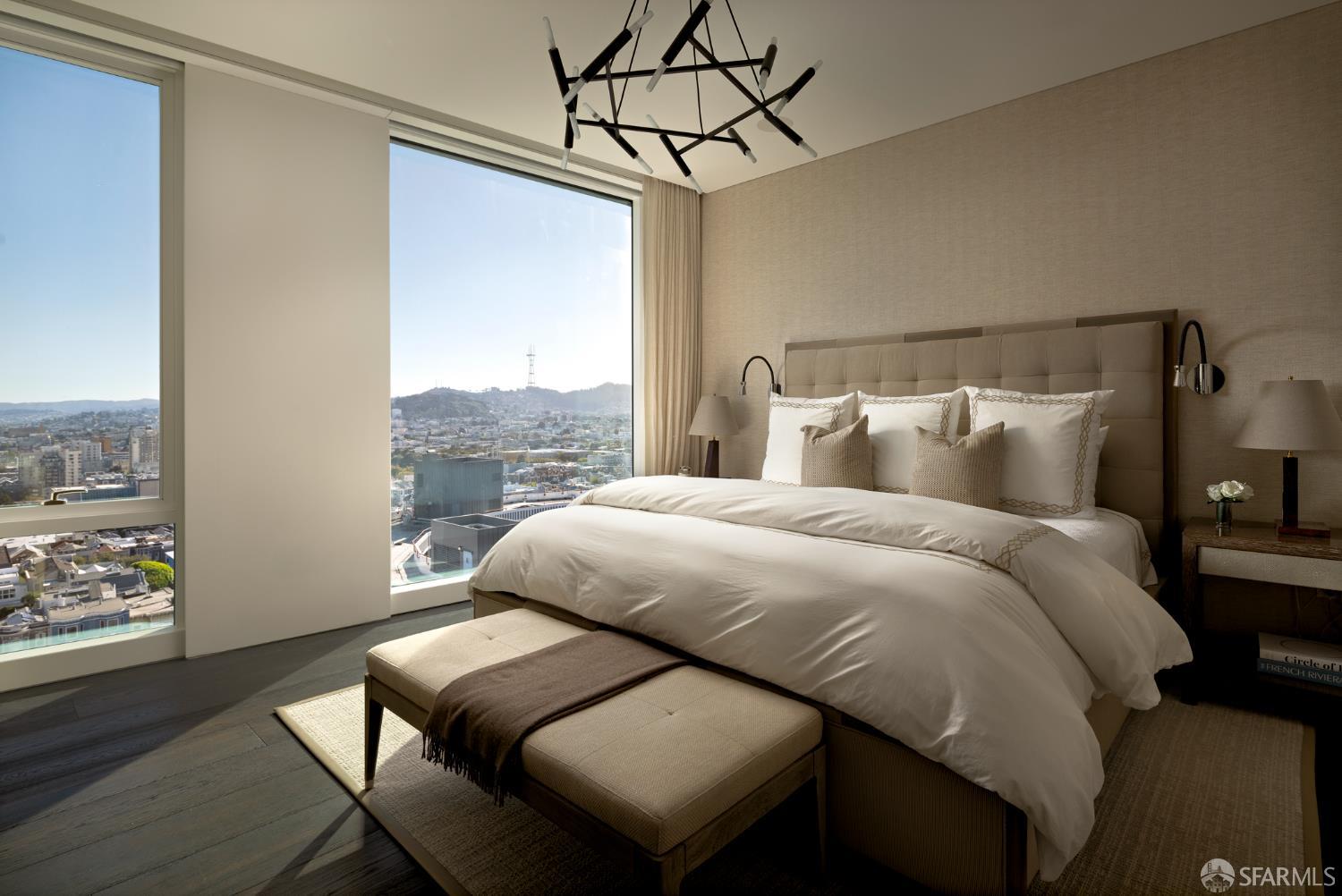 2121 Webster Street, Unit GPH1 San Francisco, CA 94115 - Photo 22 of 34 a bed sitting in a bedroom next to a window