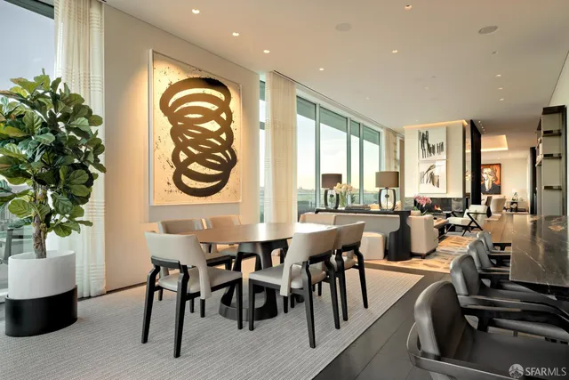 a view of a dining room with furniture window and outside view