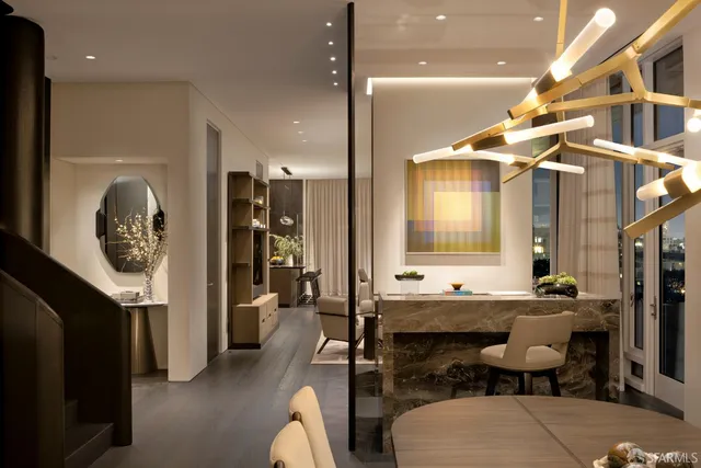 a bathroom with a sink mirror and toilet