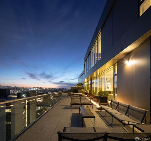 a view of a balcony with chairs